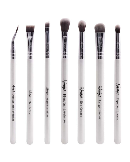 Set of 7 vegan eyeshadow brushes with black pearl-coated handles by Nanshy, including bent eyeliner, angled detailer, flat definer, blending eyeshadow, eye crease, tapered crease, and large shader brush.