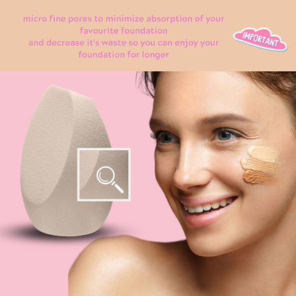 Woman using Drop of Finesse Makeup Blending Sponge with a smile, showcasing smooth, flawless foundation application against a pink background.