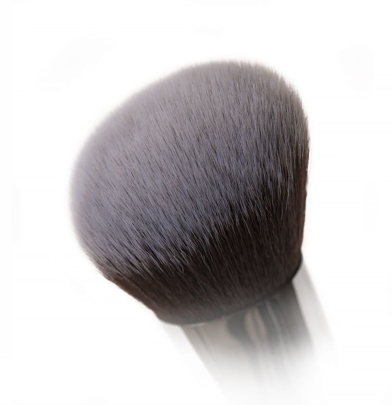 Close-up of the Blush & Bronze brush from Nanshy, featuring soft, lush bristles perfect for achieving highly contoured cheekbones and a flawless finish.