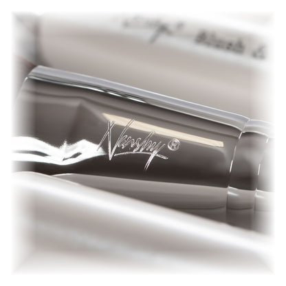 Close-up of Nanshy's Flat Foundation Brush with a sleek metal ferrule engraved with the Nanshy logo.