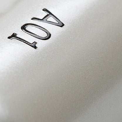 Close-up of the Pearl Coated Handle with engraved "104" on the Pencil Makeup Brush.